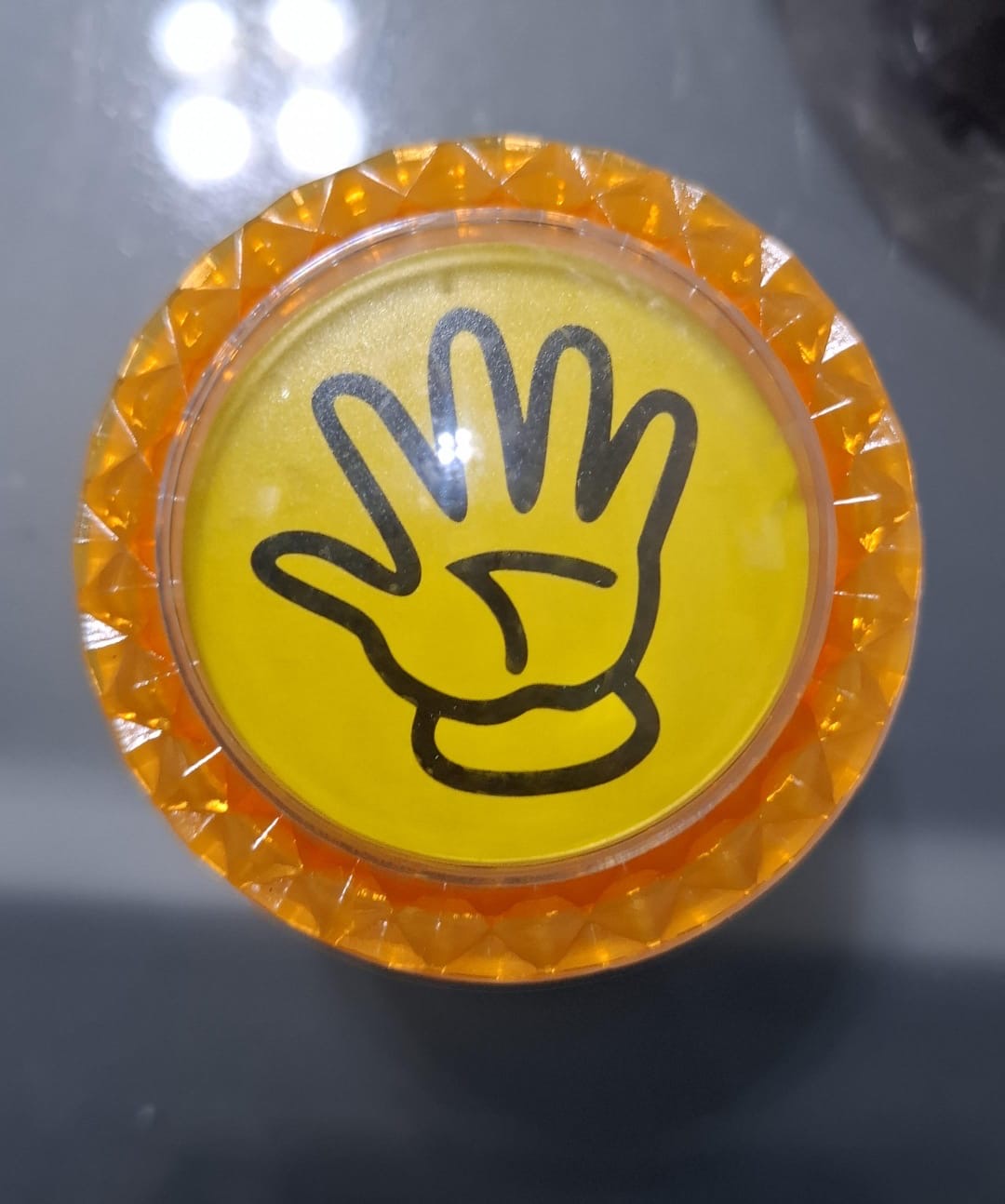 Botón Manita